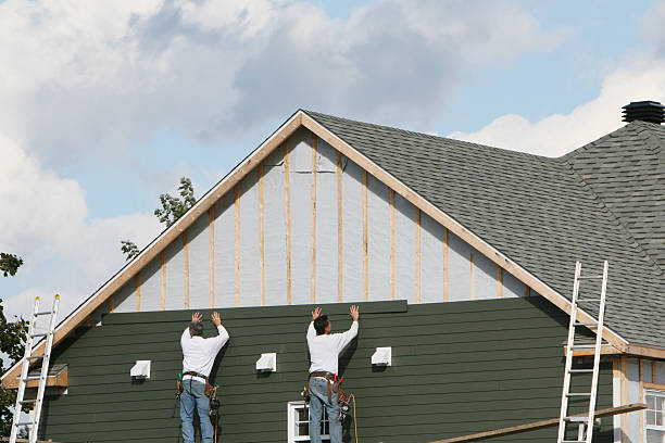 Professional Storm Damage Siding Repair technician working in Canal Winchester, OH